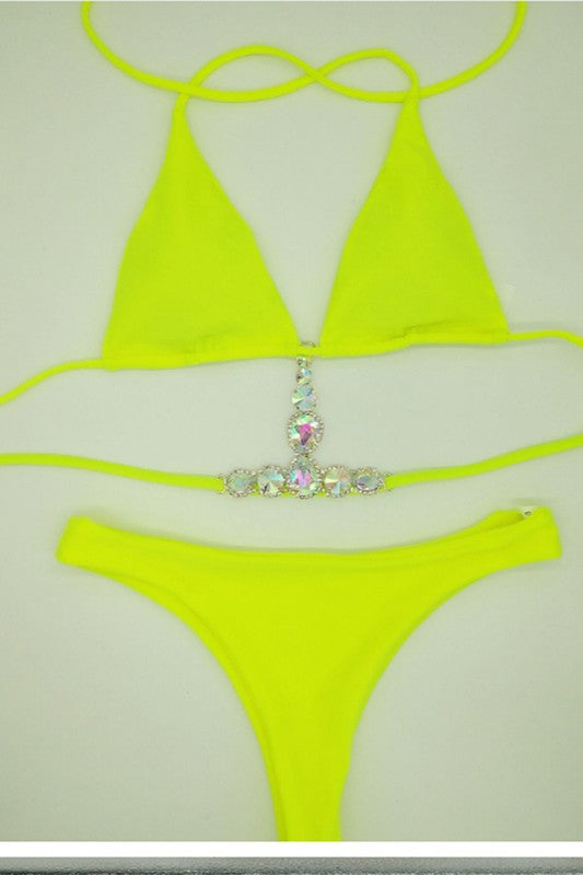 Simple bikini with accent jewels as third piece